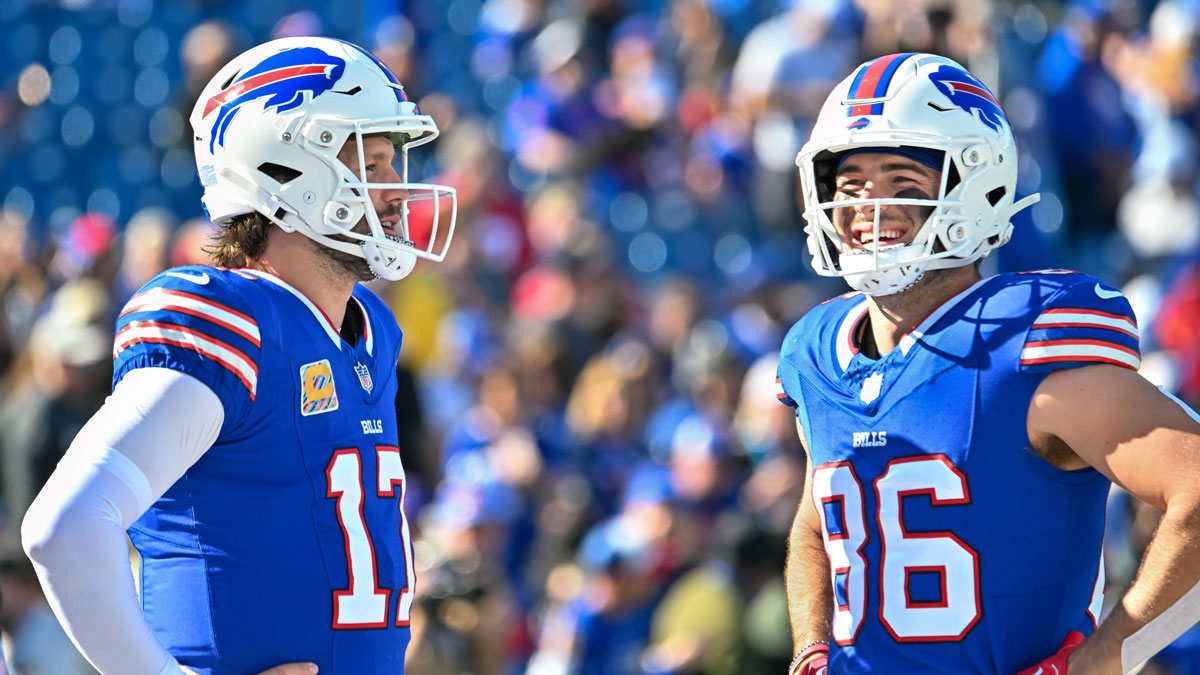 Buffalo Bills quarterback Josh Allen (17) and tight end Dalton Kincaid (86) have a word before a game against the Tennessee Titans at Highmark Stadium.