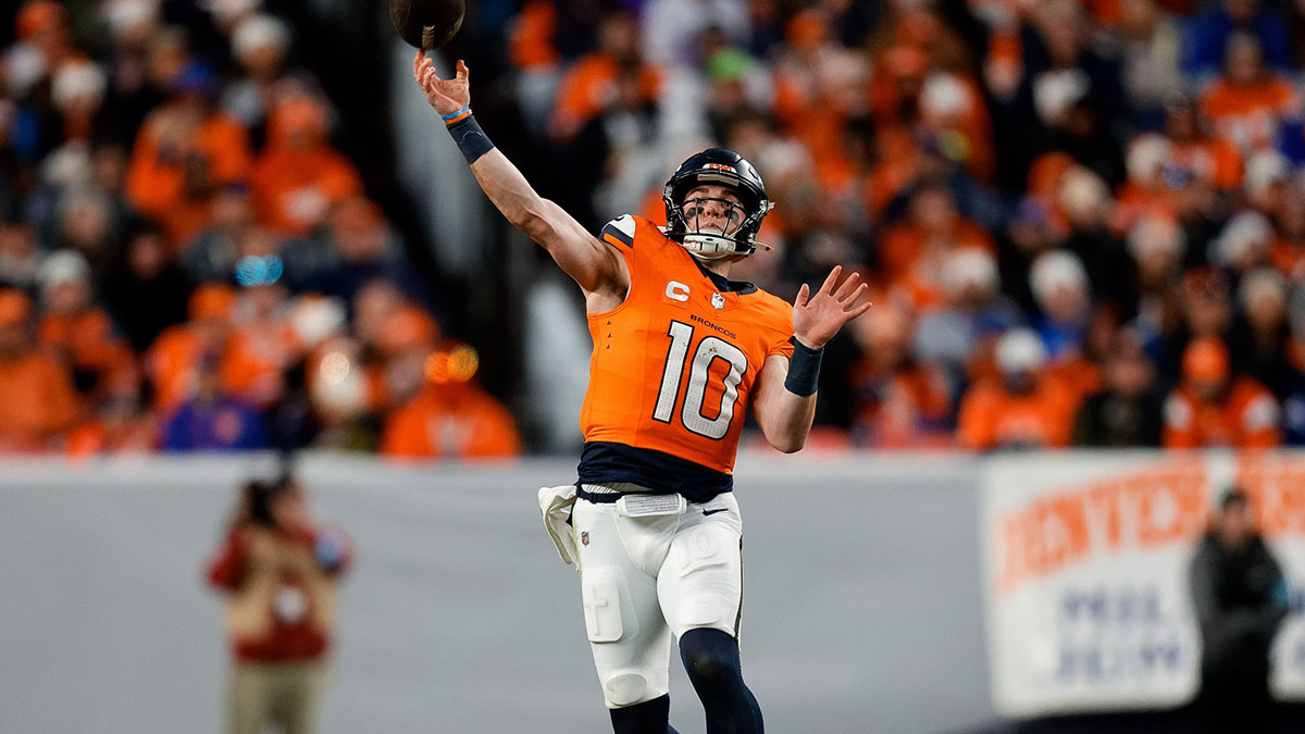 Dec 15, 2024; Denver, Colorado, USA; Denver Broncos quarterback Bo Nix (10) attempts a pass in the third quarter against the Indianapolis Colts at Empower Field at Mile High.
