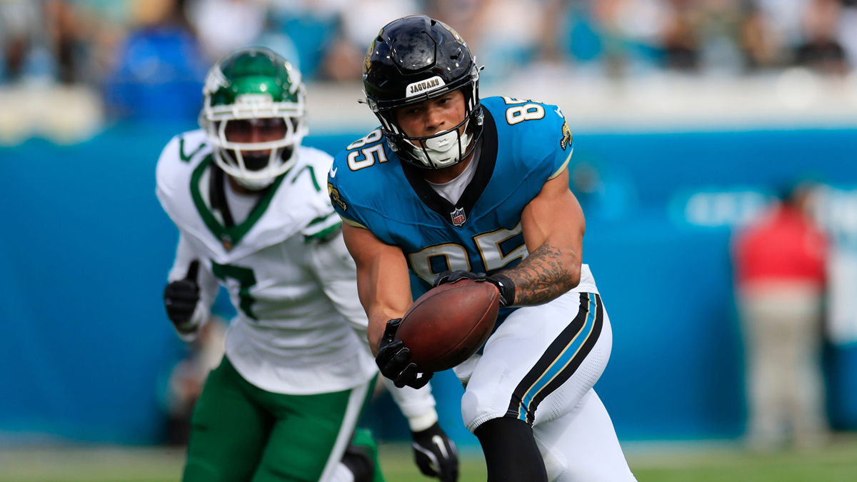 Jacksonville Jaguars tight end Brenton Strange (85) hauls in a reception against New York Jets defensive end Haason Reddick (7) during the first quarter Sunday, Dec. 15, 2024 at EverBank Stadium in Jacksonville, Fla.