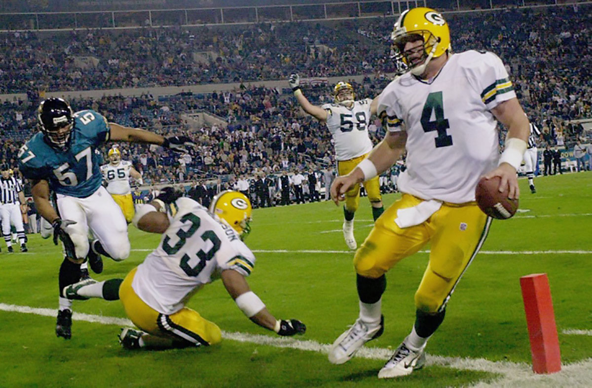 Green Bay Packers quarterback Brett Favre runs in for a touchdown during the closing moments of the fourth quarter of their game against the Jacksonville Jaguars Monday, December 3, 2001 at Alltel Stadium in Jacksonville, Fla.