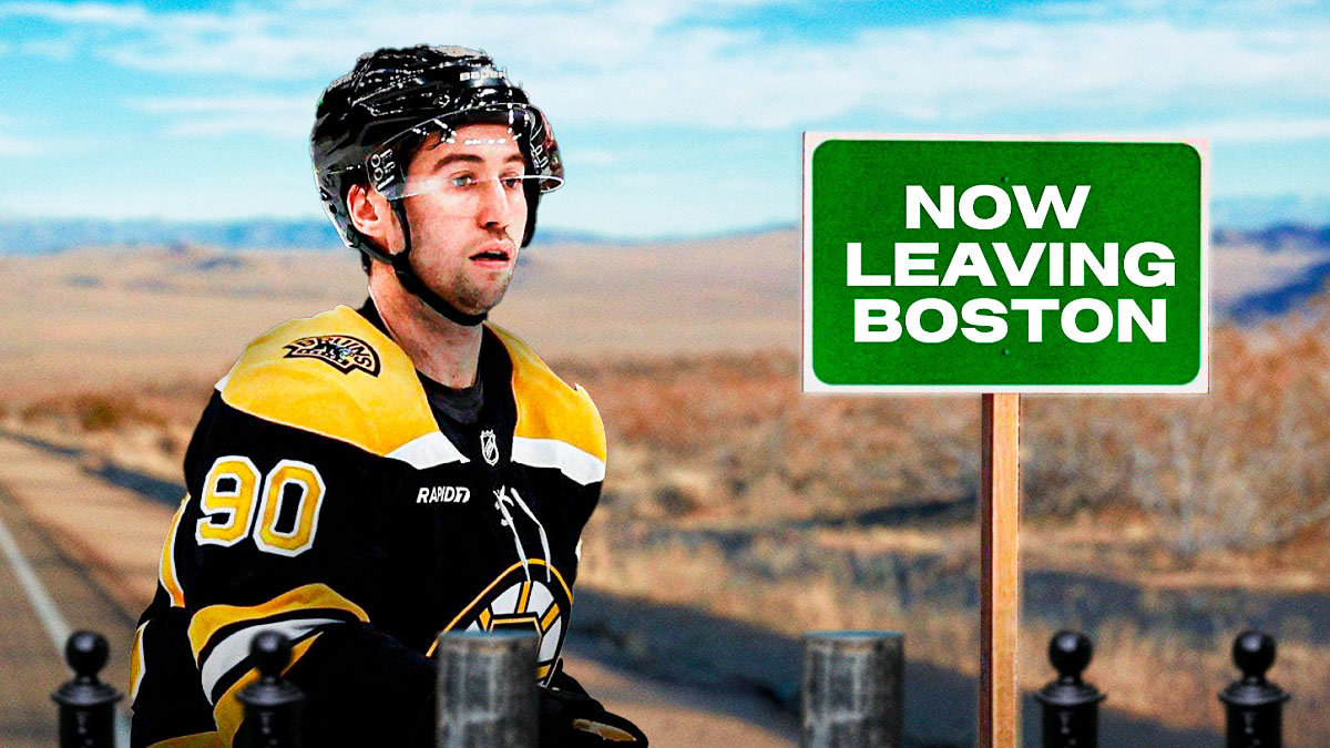 Tyler Johnson in Bruins jersey. Road sign that says NOW LEAVING BOSTON next to him