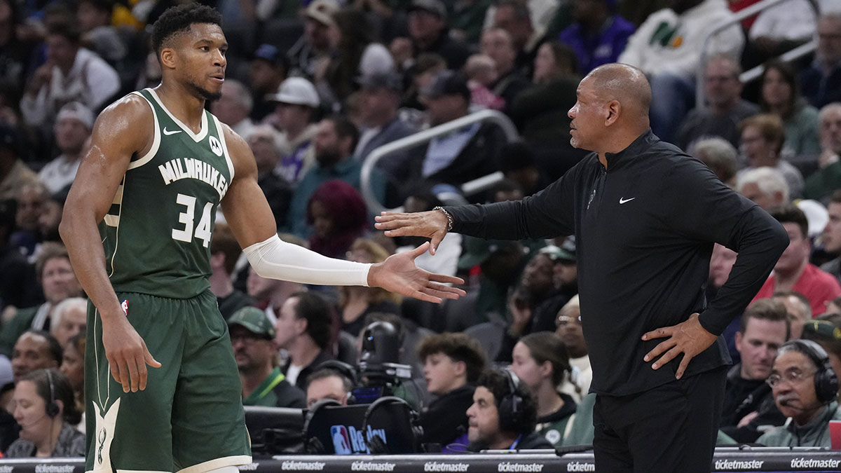 Milwaukee Bucks head coach Doc Rivers takes Milwaukee Bucks forward Giannis Antetokounmpo (34) out of the game in the fourth quarter against the Chicago Bulls at Fiserv Forum. 