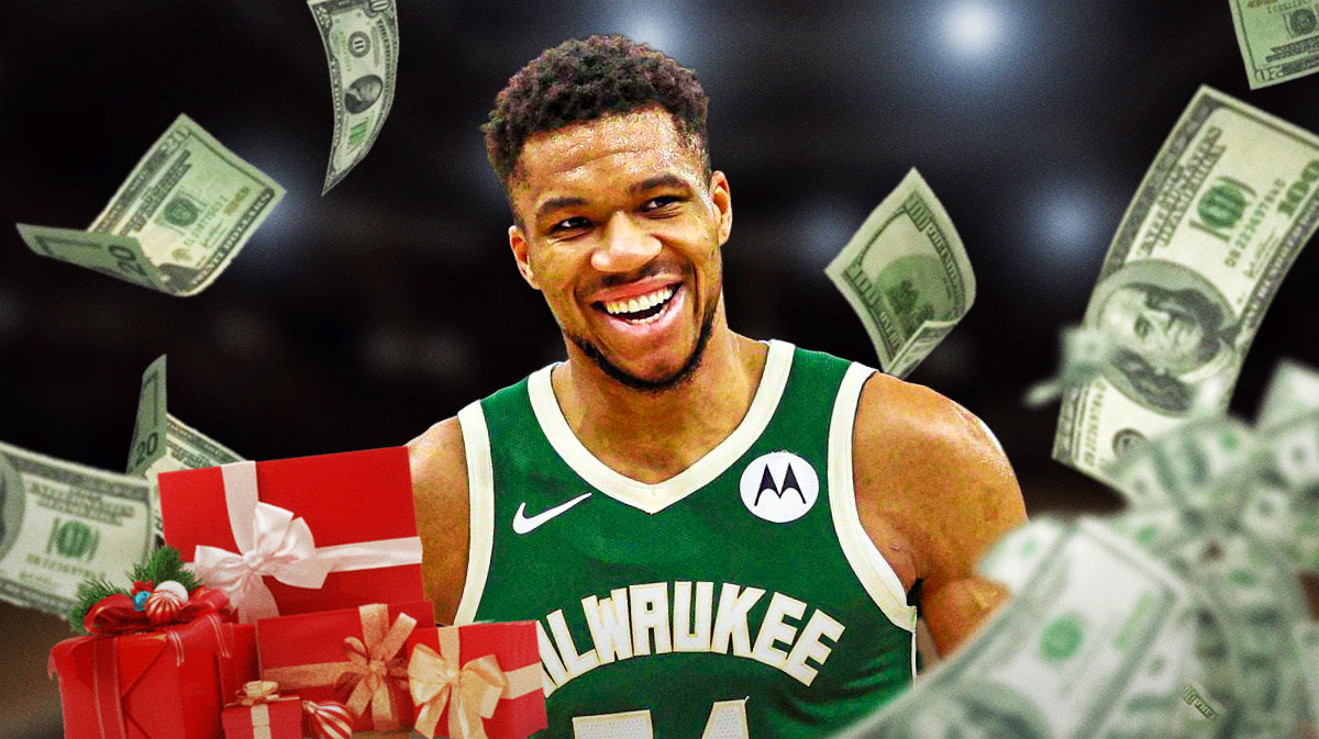 Giannis Antetokounmpo with the NBA Cup and money emojis floating around the picture.