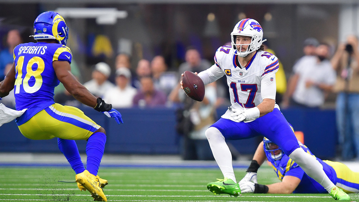 Buffalo Bills quarterback Josh Allen (17) runs the ball against Los Angeles Rams linebacker Omar Speights (48) during the second half at SoFi Stadium.