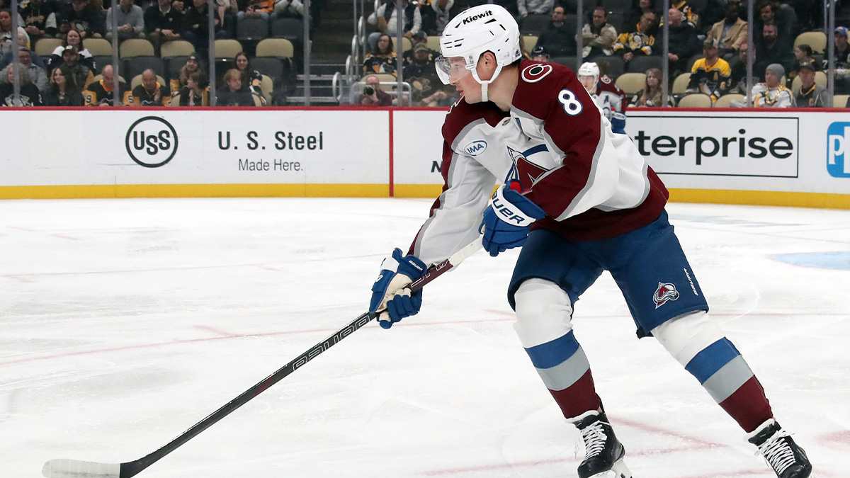 Colorado Avalanche defenseman Cale Makar (8) moves the puck against the Pittsburgh Penguins during the first period at PPG Paints Arena.