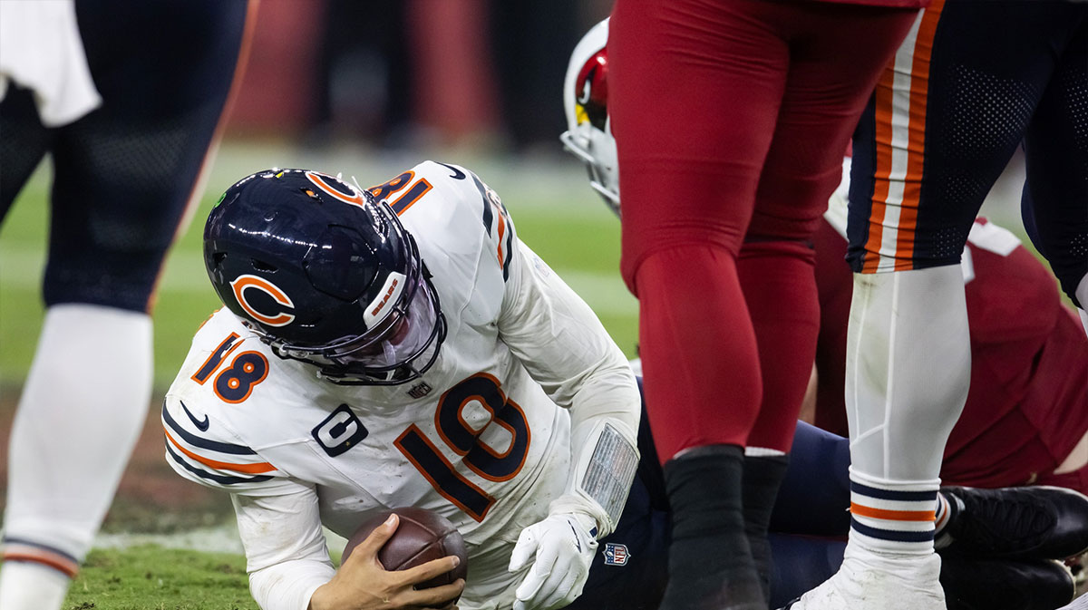 Chicago Bears quarterback Caleb Williams (18) reacts after being sacked by the Arizona Cardinals at State Farm Stadium.