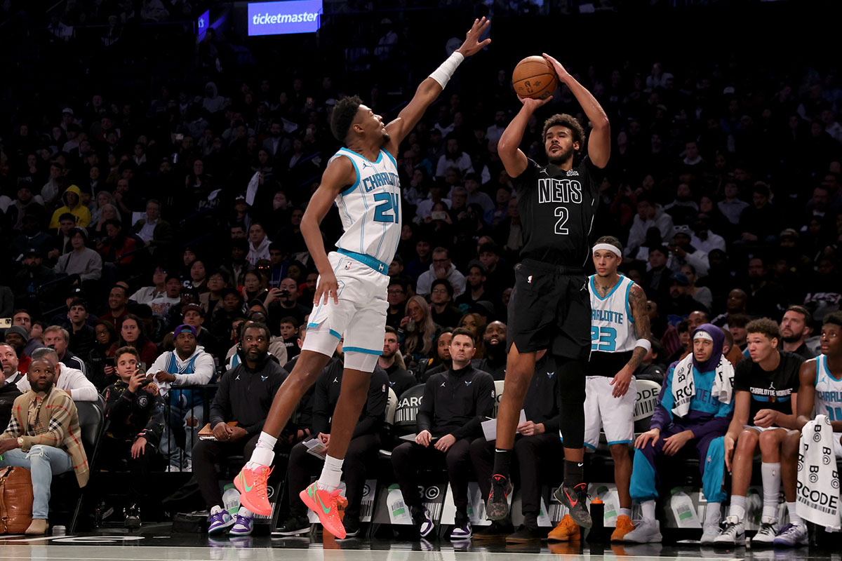 Brooklyn Nets forward Cameron Johnson (2) shoots for a three-pointer against Charlotte Hornets forward Brandon Miller (24) during the fourth quarter at Barclays Center.