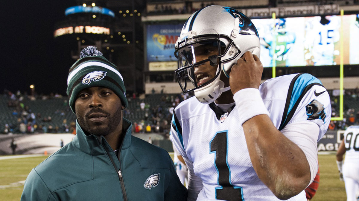 Philadelphia Eagles quarterback Michael Vick (7) talks with Carolina Panthers quarterback Cam Newton (1) after the game at Lincoln Financial Field. The Panthers defeated the Eagles 30-22.