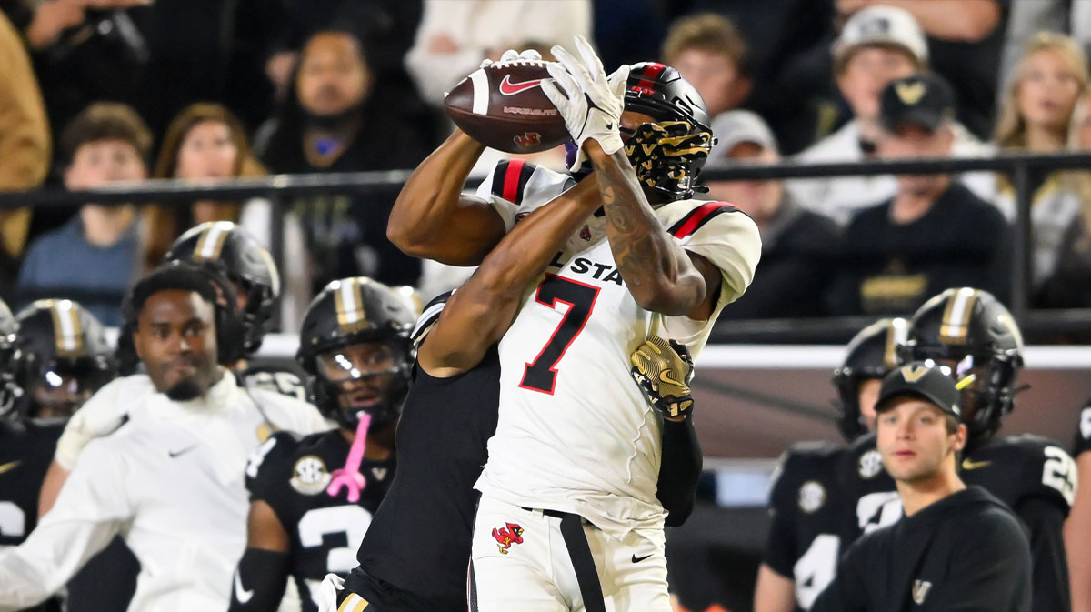 Ball State Cardinals wide receiver Cam Pickett (7) makes a catch over Vanderbilt Commodores cornerback Tyson Russell (8) during the second half at FirstBank Stadium.