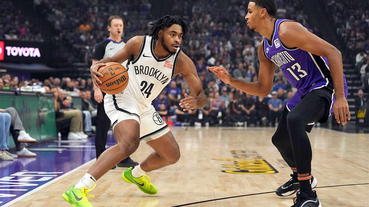 Brooklyn Nets Guard Cam Thomas (24) Dribbles vs. Sacramento Kings alleged Keegan Murrai (13) during the first quarter in the Golden 1 Center.