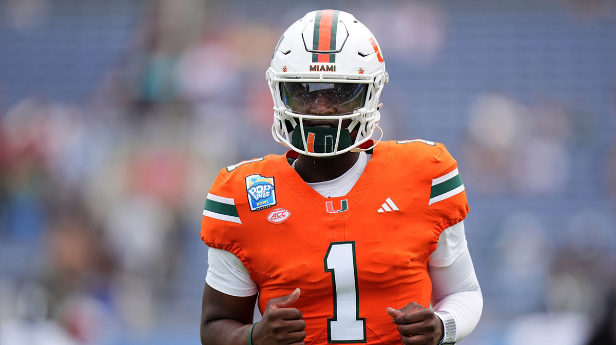 Miami Hurricanes quarterback Cam Ward (1) warms up prior to the game against the Iowa State Cyclones at Camping World Stadium.
