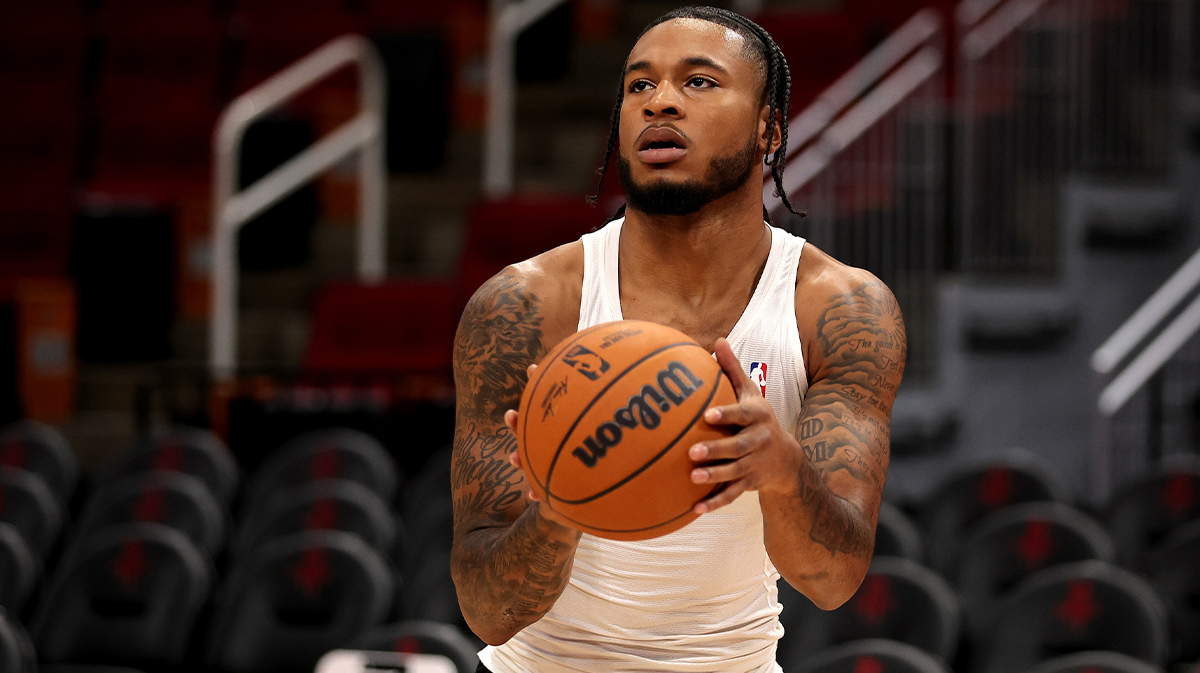 Houston Rockets guard Cam Whitmore (7) warms up prior to the game against the Golden State Warriors at Toyota Center.