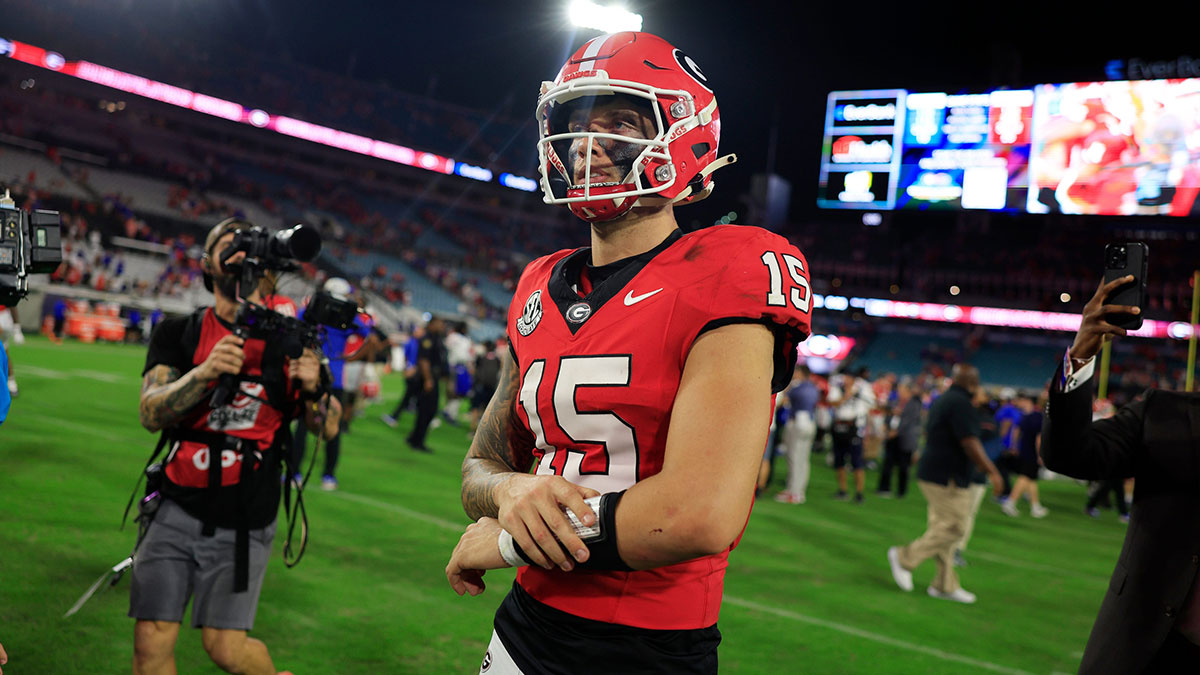 Georgia Bulldogs quarterback Carson Beck (15) walks off the field after the game of an NCAA college football matchup Saturday, Nov. 2, 2024 at EverBank Stadium in Jacksonville, Fla. The Georgia Bulldogs defeated the Florida Gators 34-20.