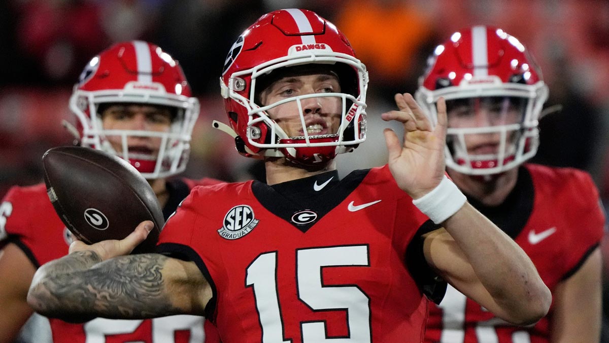 Georgia quarterback Carson Beck (15) warms up before the start of a NCAA college football game against Georgia Tech