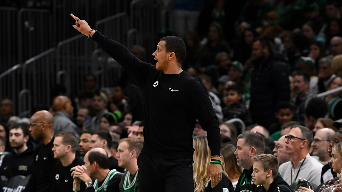 Boston Celtics head coach Joe Mazzulla signals from the sideline during the first half against the Philadelphia 76ers at TD Garden.