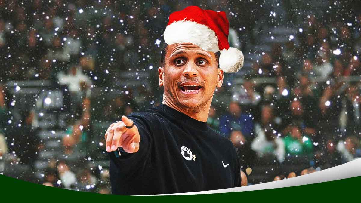 Joe Mazzulla yelling while wearing a Santa hat. can be a wintery background or an NBA cour