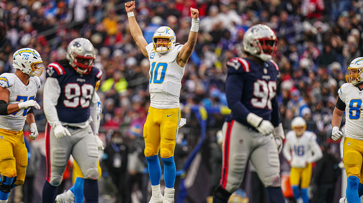 Chargers quarterback Justin Herbert (10) reacts after his touchdown pass against the New England Patriots in the third quarter at Gillette Stadium