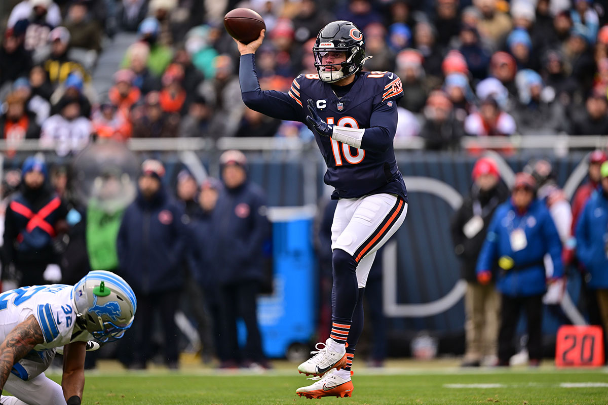 Chicago Bears quarterback Caleb Williams (18) passes the ball against the Detroit Lions during the first quarter at Soldier Field.