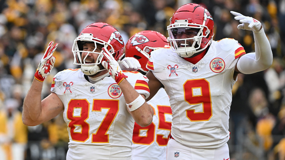 Kansas City Chiefs tight end Travis Kelce (87) celebrates a touchdown wide receiver JuJu Smith-Schuster (9) against the Pittsburgh Steelers during the second half at Acrisure Stadium.