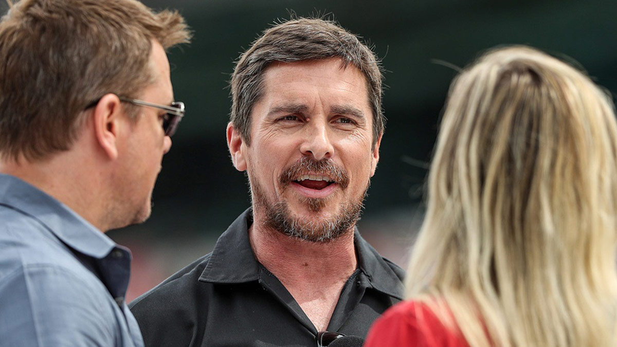 Center, actor Christian Bale waits on the grid before the start of the 103rd running of the Indy 500 at Indianapolis Motor Speedway, Sunday, May 26, 2019. 103rd Runnning Of The Indy 500 At Indianapolis Motor Speedway Sunday May 26 2019