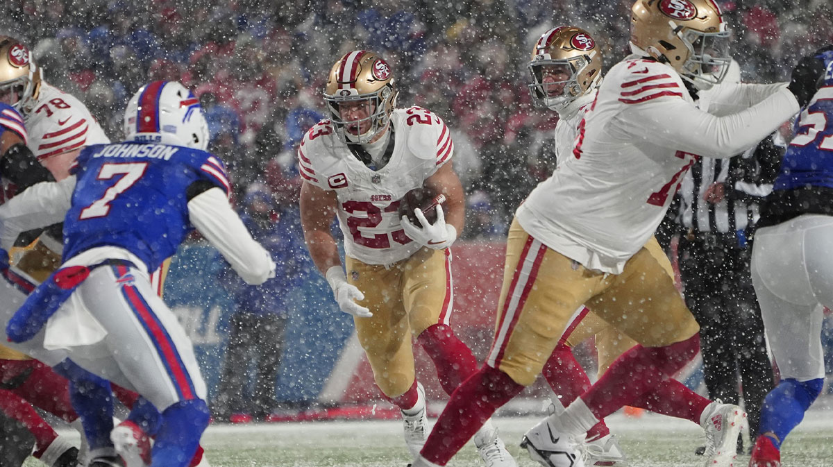 San Francisco 49ers running back Christian McCaffrey (23) runs with the ball against the Buffalo Bills during the first half at Highmark Stadium. 