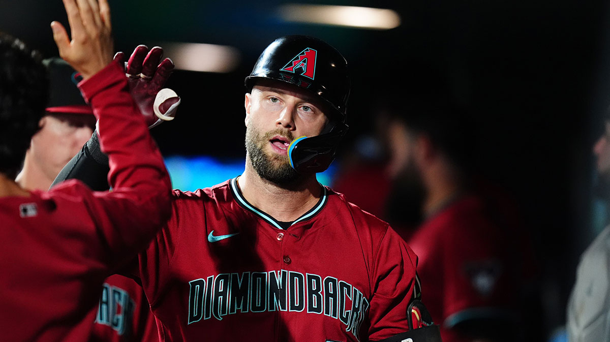 Arizona Diamondbacks first base Christian Walker (53) celebrators his solo home run in the eighth inning against the Colorado Rockies at Coors Field.