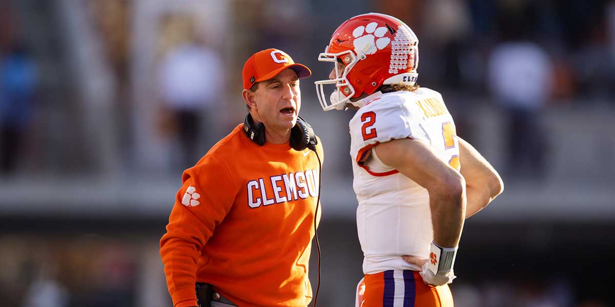 Clemson Tigers head coach Dabo Swinney with quarterback Cade Klubnik (2) against the Texas Longhorns during the first half of the CFP National playoff first round at Darrell K Royal-Texas Memorial Stadium.