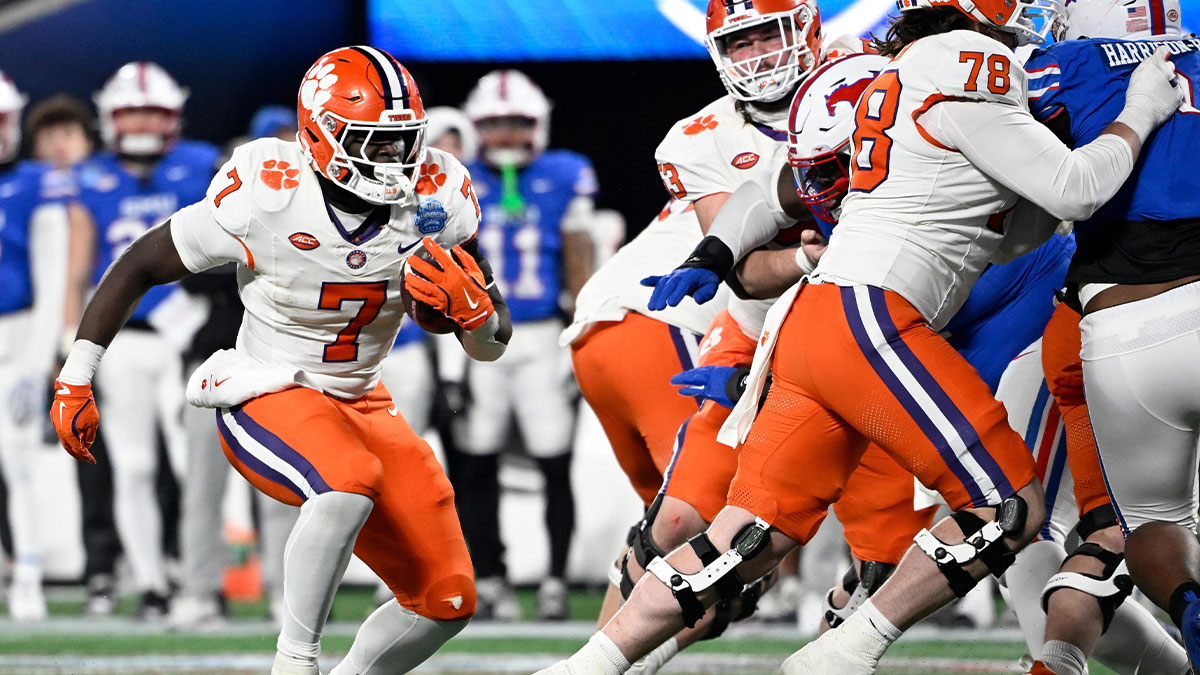 Clemson Tigers running back Phil Mafah (7) runs during the third quarter against the Southern Methodist Mustangs in the 2024 ACC Championship game at Bank of America Stadium.