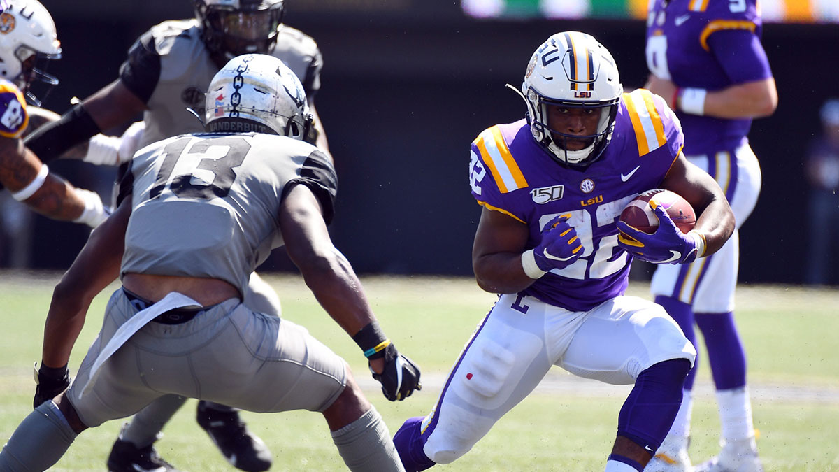 LSU Tigers running back Clyde Edwards-Helaire (22) runs for a short gain during the second half against the Vanderbilt Commodores at Vanderbilt Stadium.
