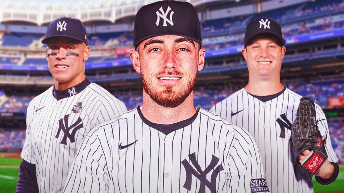Cody Bellinger in a Yankees jersey. Yankees Aaron Judge, Yankees Gerrit Cole both in background smiling.