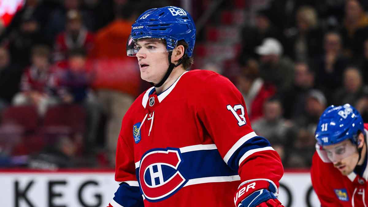 Montreal Canadiens right wing Cole Caufield (13) looks on against the New York Islanders during the second period at Bell Centre.