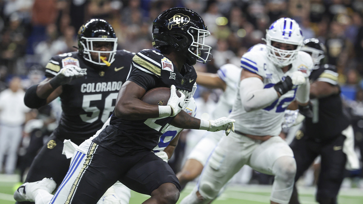 Colorado Buffaloes running back Isaiah Augustave (23) runs with the ball during the second quarter against the Brigham Young Cougars at Alamodome.