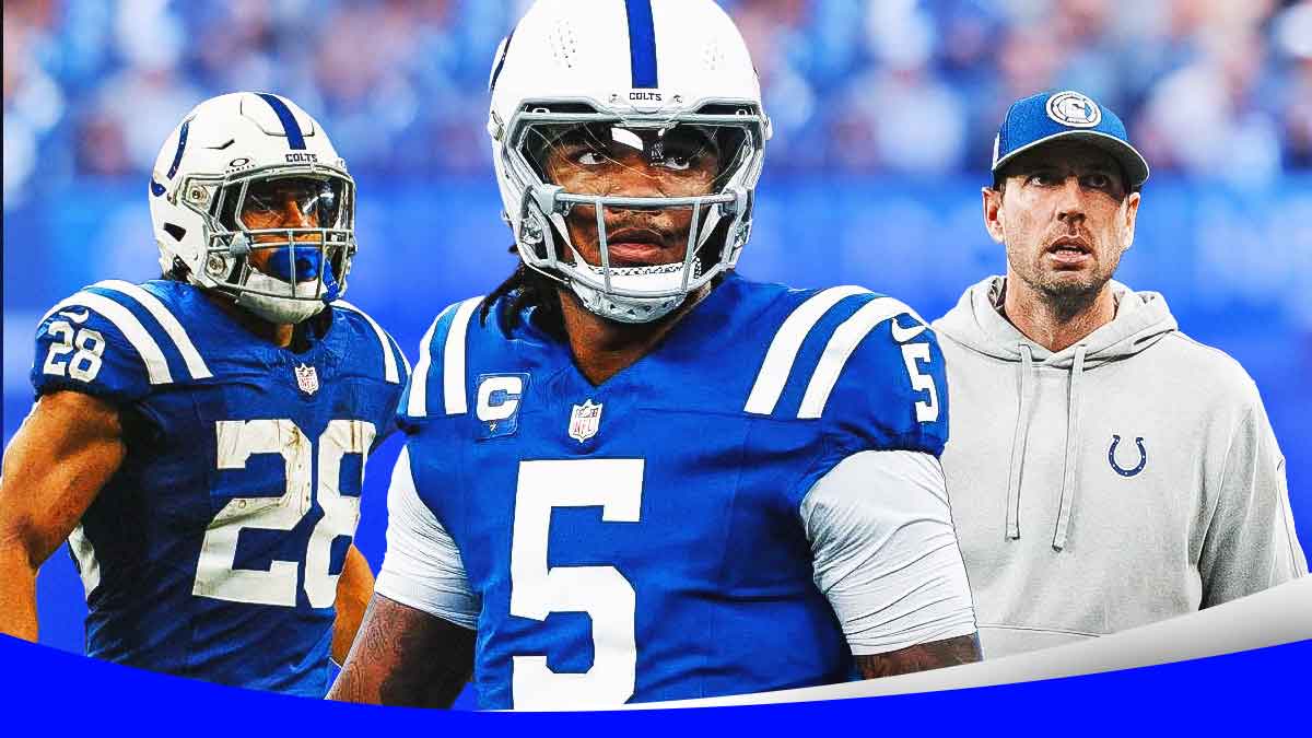 Anthony Richardson in the middle, Shane Steichen, Jonathan Taylor around him, Indianapolis Colts wallpaper in the background