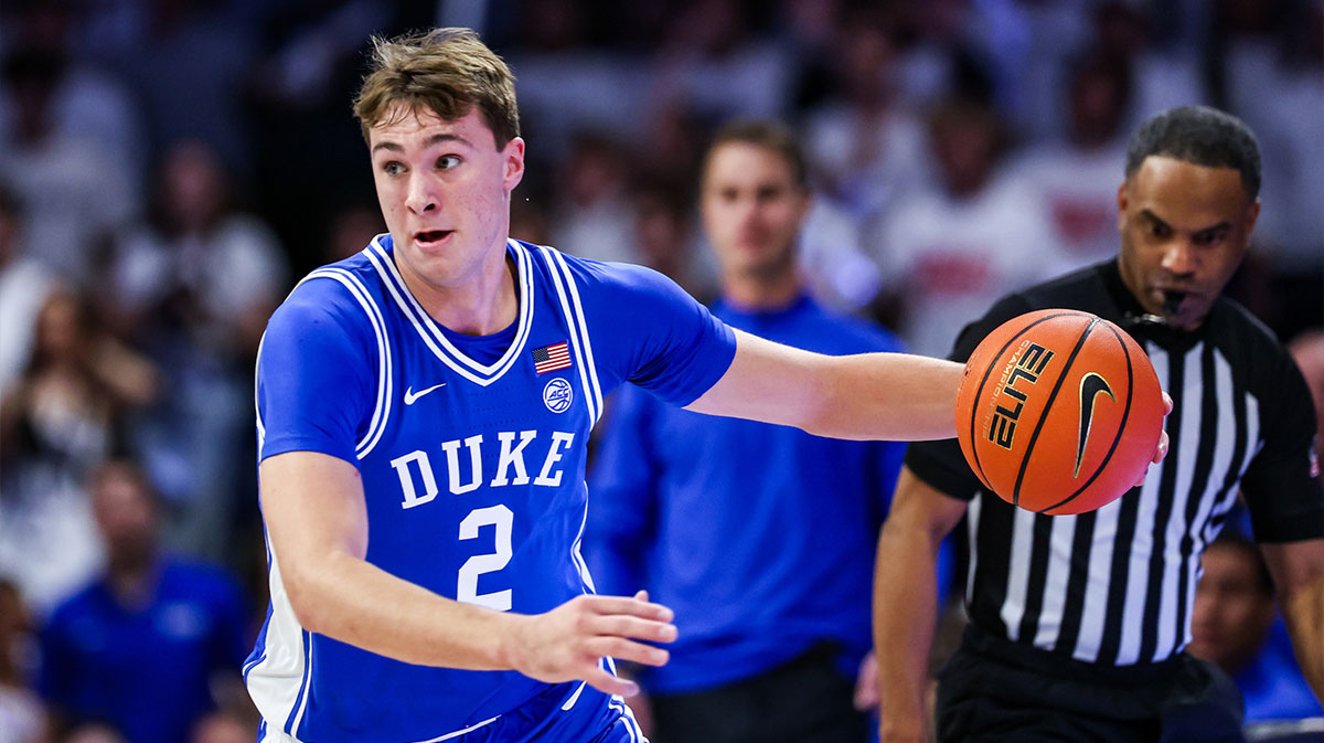 Duke Blue Devils guard Cooper Flagg (2) dribbles the ball during the first half against the Arizona Wildcats at McKale Center.