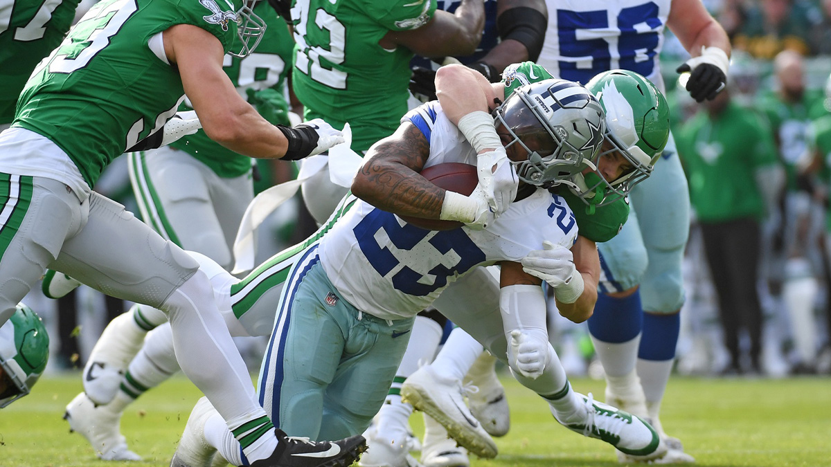 Dallas Cowboys running back Rico Dowdle (23) is tackled by Philadelphia Eagles cornerback Cooper DeJean (33) during the first quarter at Lincoln Financial Field.