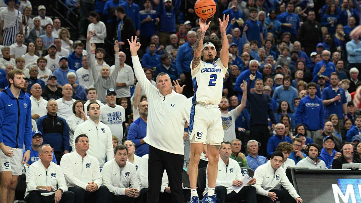 Creighton Bluejays head coach Greg McDermott watches as guard Pop Isaacs (2) attempts a three point shot against the Kansas Jayhawks during the second half at CHI Health Center Omaha.