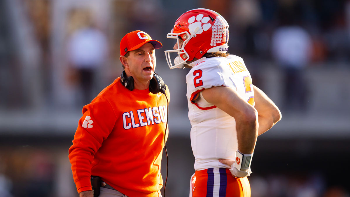  Clemson Tigers head coach Dabo Swinney with quarterback Cade Klubnik (2) against the Texas Longhorns during the first half of the CFP National playoff first round at Darrell K Royal-Texas Memorial Stadium.