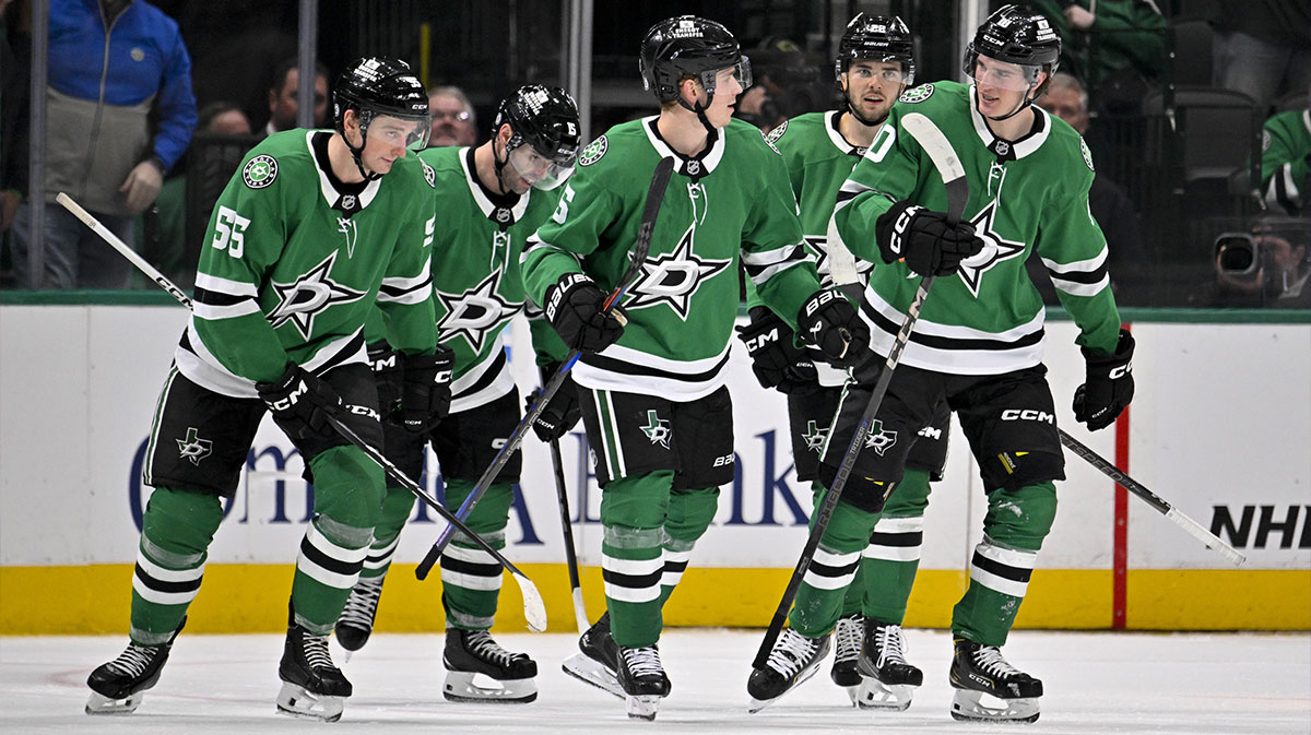 Dallas Stars defenseman Thomas Harley (55) and defenseman Nils Lundkvist (5) and center Colin Blackwell (15) and defenseman Nils Lundkvist (5) and center Mavrik Bourque (22) skate off the ice after Harley scores a goal against the Calgary Flames during the third period at the American Airlines Center.