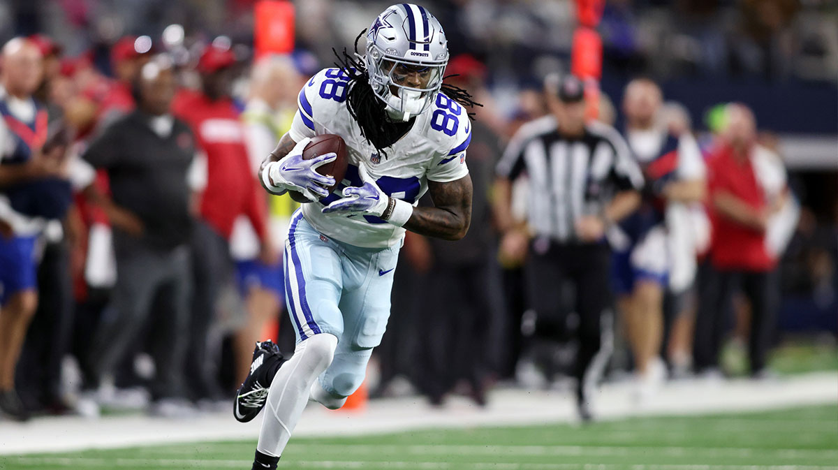 Cowboys wide receiver CeeDee Lamb (88) runs after catching a pass against the Tampa Bay Buccaneers in the second quarter at AT&T Stadium.