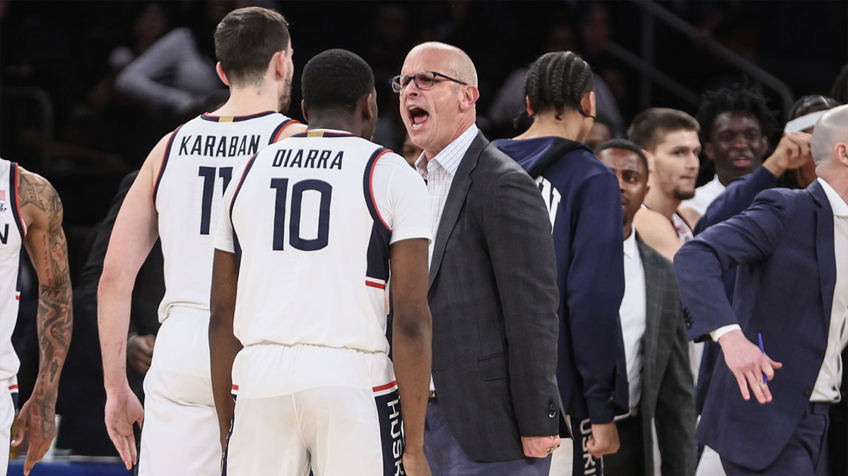 Connecticut Huskies head coach Dan Hurley celebrates with guard Hassan Diarra (10) during a timeout in the second half against the Gonzaga Bulldogs at Madison Square Garden.