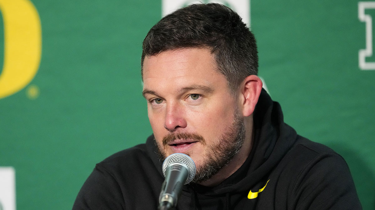 Oregon Ducks head coach Dan Lanning talks to the media during the post game press conference following the game against the Wisconsin Badgers at Camp Randall Stadium