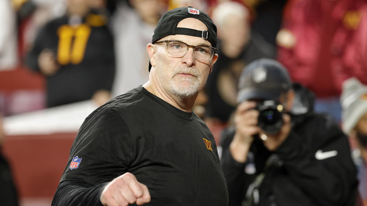 Washington Commanders head coach Dan Quinn reacts while leaving the field after defeating the Atlanta Falcons at Northwest Stadium.
