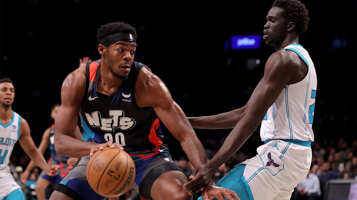 Brooklyn Nets center Day'Ron Sharpe (20) controls the ball against Charlotte Hornets forward JT Thor (21) during the first quarter at Barclays Center.