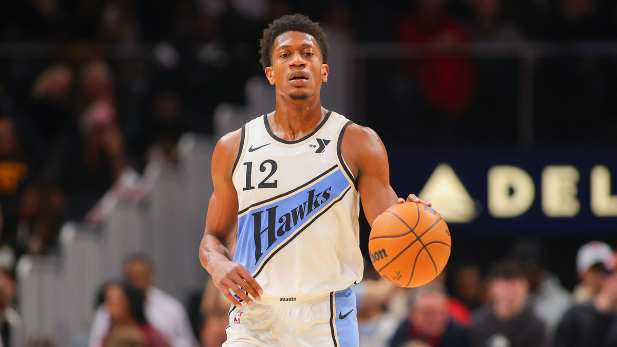 Atlanta Hawks forward De'Andre Hunter (12) dribbles against the Chicago Bulls in the first quarter at State Farm Arena. 