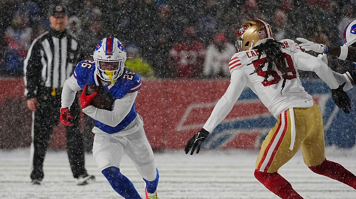 Bills Ty Johnson tries to avoid 49ers De'Vondre Campbell Sr. unsuccessfully on the carry during first half action of their home game against the San Francisco 49ers in Orchard Park on Dec. 1, 2024.