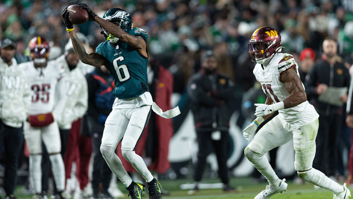 Philadelphia Eagles wide receiver DeVonta Smith (6) makes a catch in front of Washington Commanders safety Jeremy Chinn (11) during the second quarter at Lincoln Financial Field.