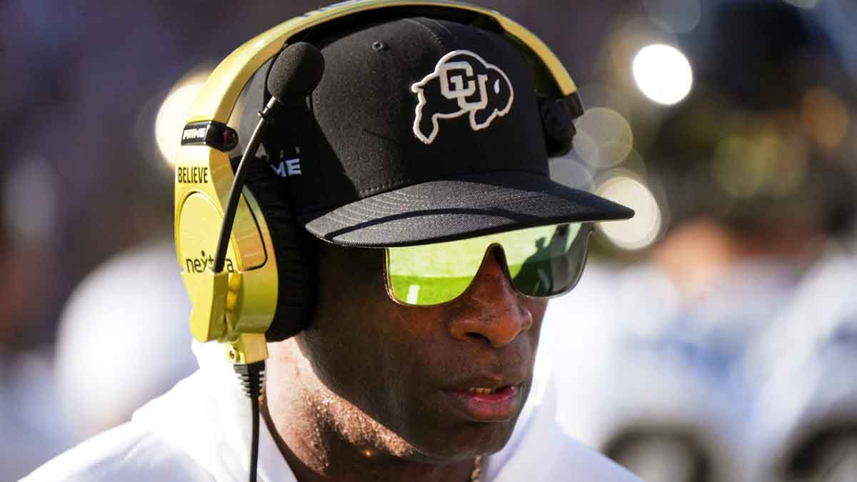 Colorado Buffaloes head coach Deion Sanders walks the sidelines as his team takes on the ASU Sun Devils at Mountain America Stadium in Tempe on Oct. 7, 2023.