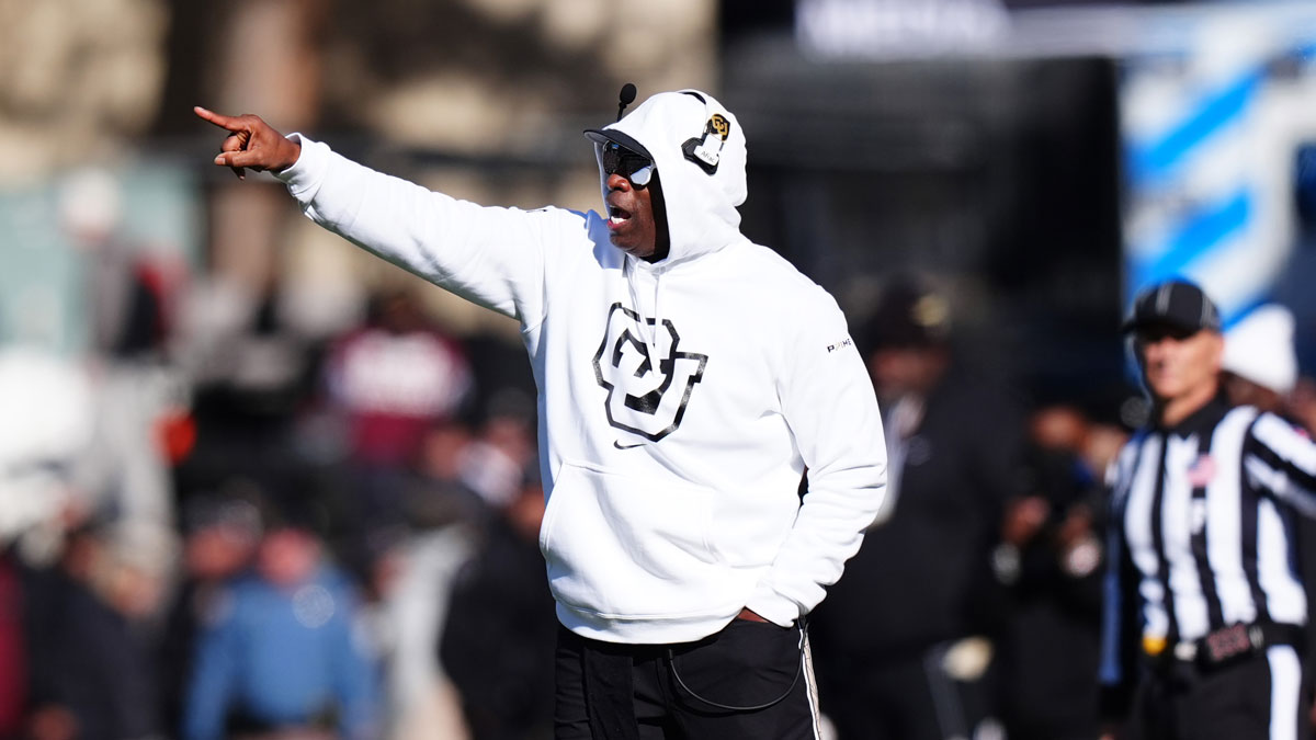 Colorado Buffaloes head coach Deion Sanders calls out in the second quarter against the Oklahoma State Cowboys at Folsom Field.
