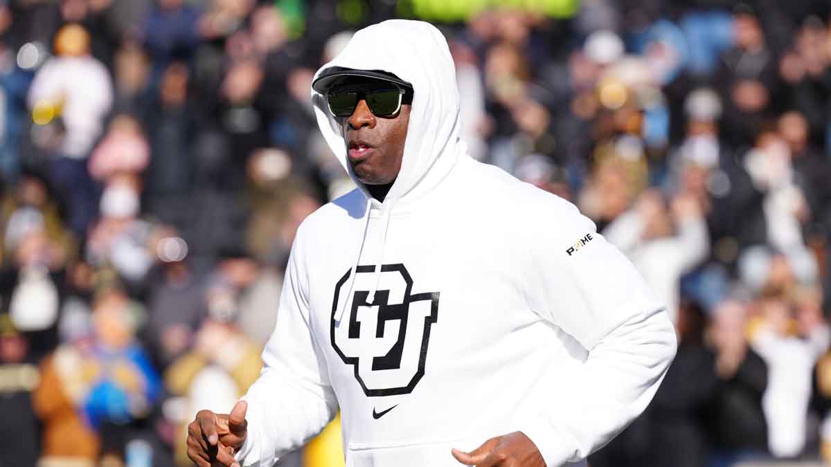 Colorado Buffaloes head coach Deion Sanders walks onto the field before the game against the Oklahoma State Cowboys at Folsom Field. 