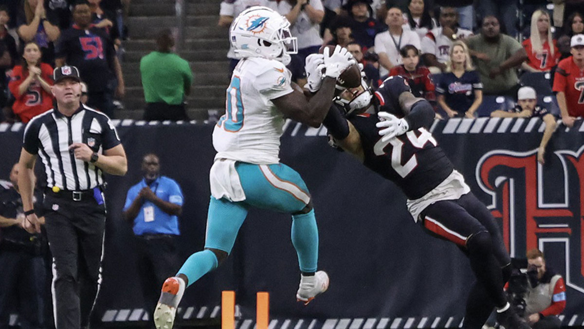 Houston Texans cornerback Derek Stingley Jr. (24) intercepts the ball against Miami Dolphins wide receiver Tyreek Hill (10) in the fourth quarter at NRG Stadium.